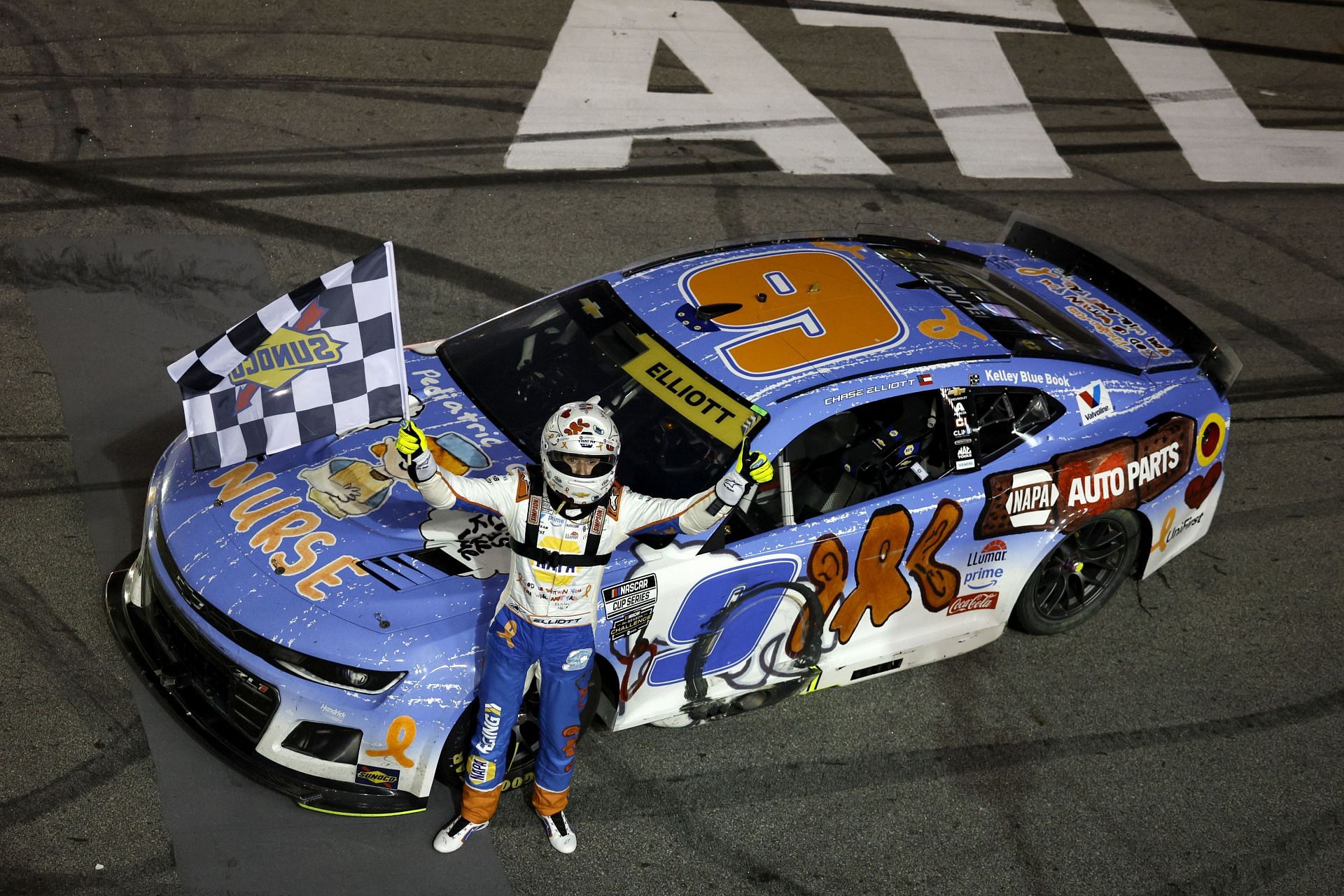 Chase Elliott, driver of the #9 NAPA/Children's Chevrolet, celebrates after winning the NASCAR Cup Series Quaker State 400 Available at Walmart at Echo Park Speedway on June 28, 2025 in Hampton, Georgia - Source: Getty